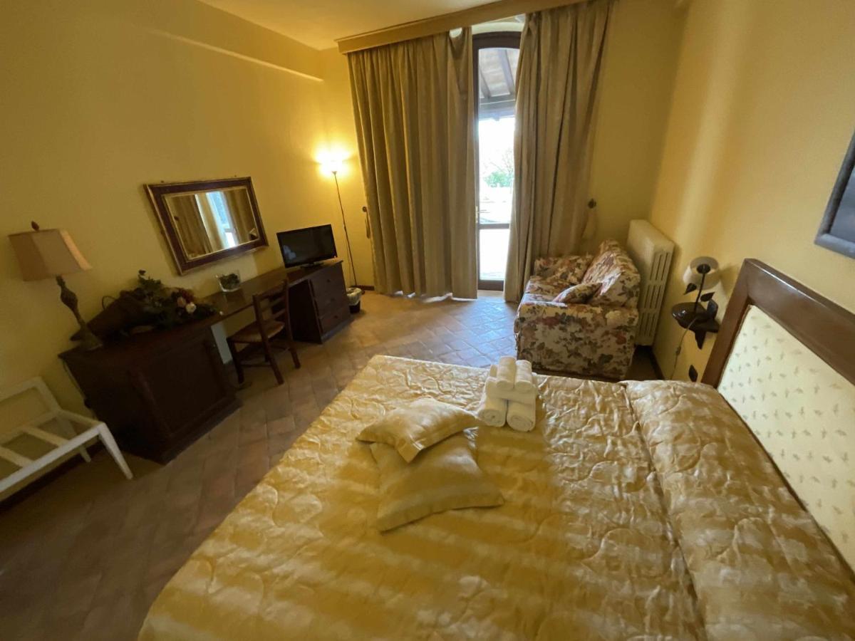 Aparthotel Residenza Collefiorito Todi Pokoj fotografie
